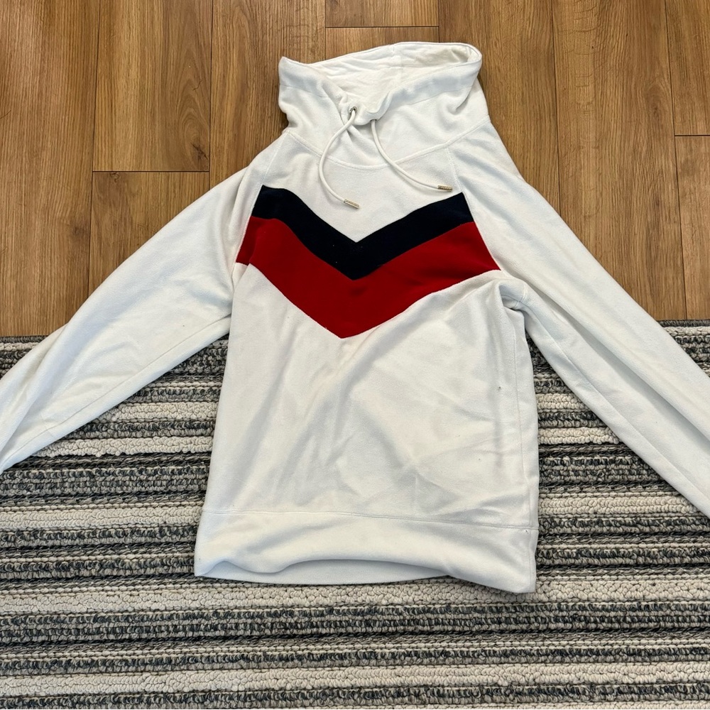 This is a Tommy Hilfiger sweater! Super comfy and warm.